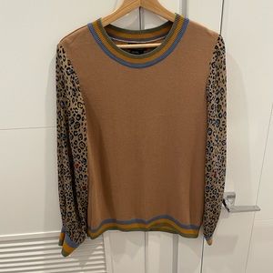 Mixed-print sweater.